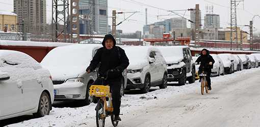 Parts of China gripped by record-low temperatures as icy snap intensifies