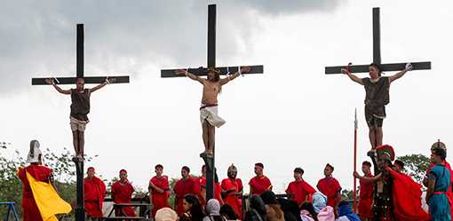 Philippines' Catholic devotees nailed to crosses to re-enact crucifixion