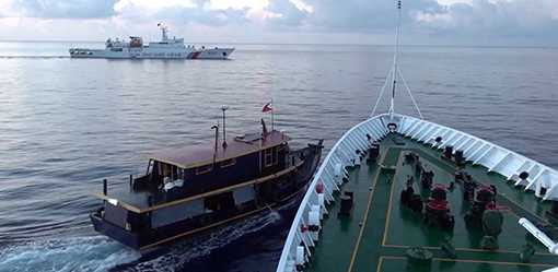 Philippines says Chinese coastguard 'intentionally' collided with its boats