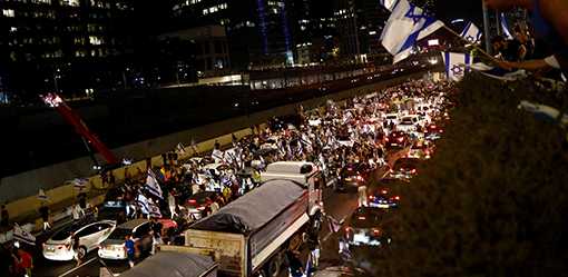 Protests rock Israel as it passes curbs on some Supreme Court powers