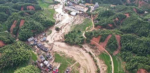 Rescuers in China race to find the missing, seal dykes after deadly floods