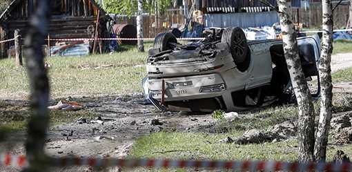 Russia blames Ukraine, U.S. for car bomb that wounded writer