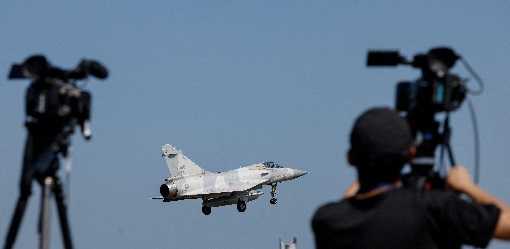 Senior Taiwan security official says pressure on Taiwan from China is 'not light'