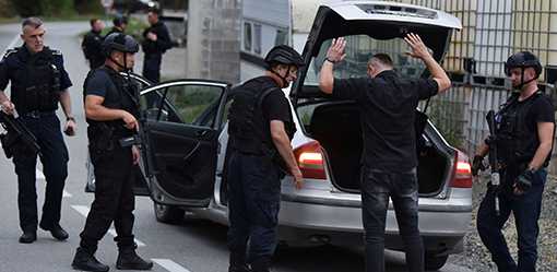 Serb gunmen battle police in Kosovo monastery siege; four dead