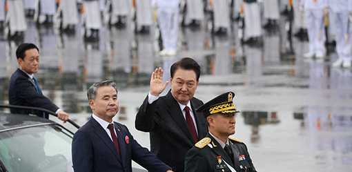 South Korea holds rare military parade, warns North over nuclear threat