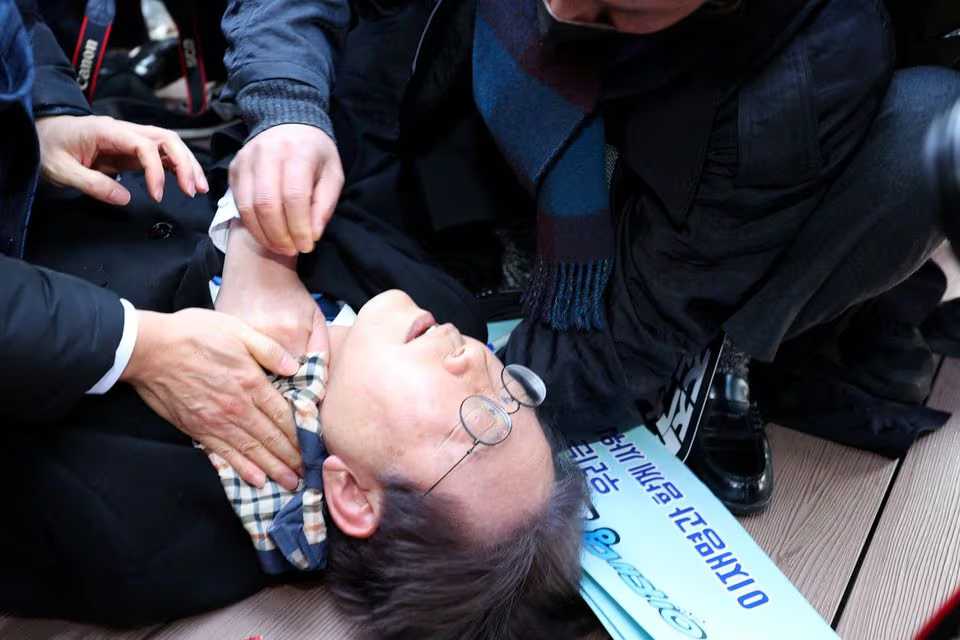 South Korea opposition chief stabbed in neck, in intensive care