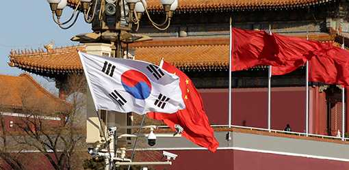 South Korea summons China envoy over warning on 'wrong bets' in ties