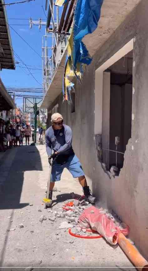 Tension erupts during the demolition of a Barangay Hall in Manila