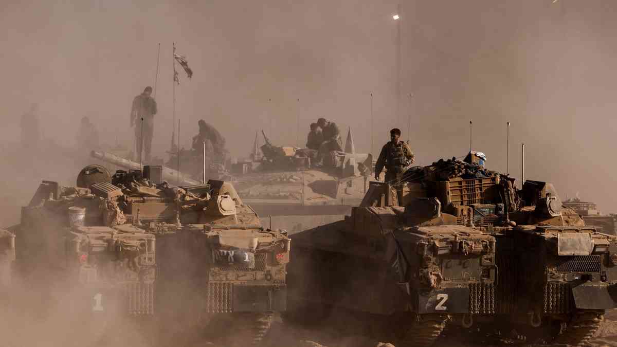 Thousands of Israeli reservists report for duty, as military chief clashes with ministers