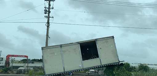 Typhoon Khanun eases off Japan's Okinawa, but islands brace for return of "unusual" storm